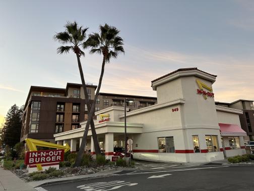 An In-N-Out with crossed palm trees.