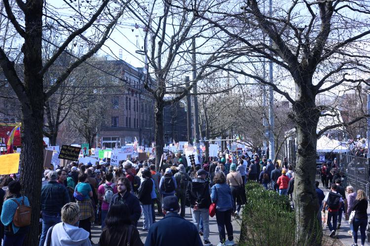Protesters marching down Pine St. from about 12th Ave.